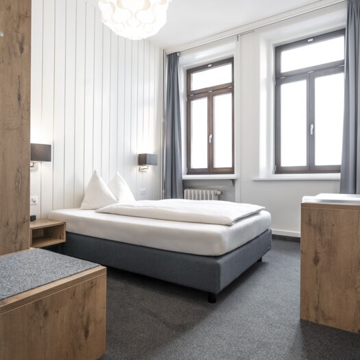 Schlicht eingerichtetes Einzelzimmer im Hotel Ochsen. | © Davos Klosters Mountains